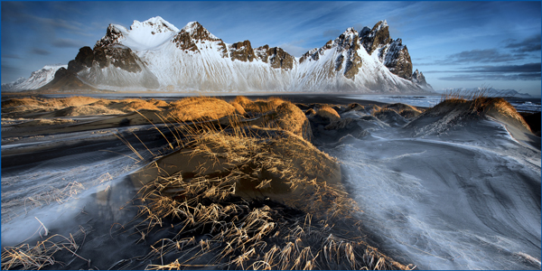 <span>Majestic Landscapes:</span> A dramatic view of Vestrahorn Mountain as seen from a beach on the Stokksnes Peninsula, in southeastern Iceland.