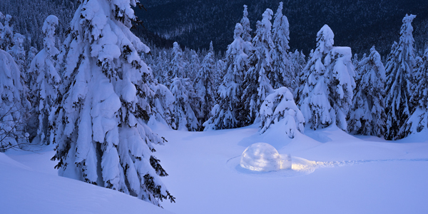 <span>Unplugged:</span> With proper cold weather gear, winter camping is challenging and rewarding; energetic campers build an igloo for shelter.